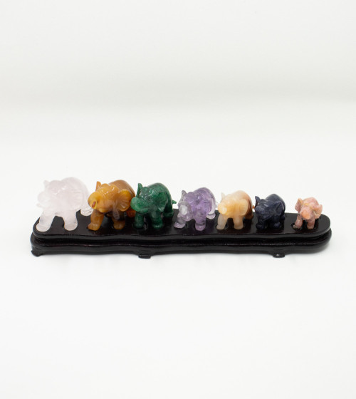 Set of seven elephants on pedestal