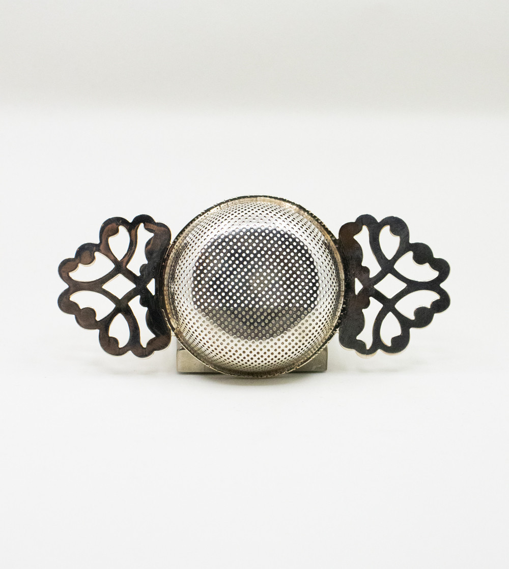 Silver tea strainer