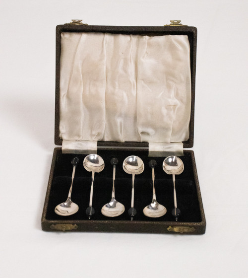 Joc de culleres de café (banys de plata)